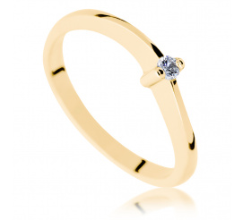 Fantazyjny pierścionek zaręczynowy ze złota - delikatna szyna i brylant o masie 0.05 ct w białej oprawie