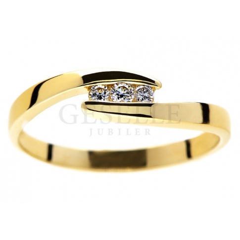 Subtelny, złoty pierścionek zaręczynowy z brylantami 0.06 ct