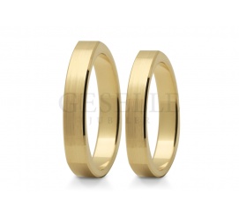 Kwadratowe obrączki ślubne z żółtego złota w minimalistycznym stylu