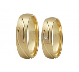 Klasyczne obrączki ślubne ze złota z delikatnym wzorem z cyrkonią lub brylantem