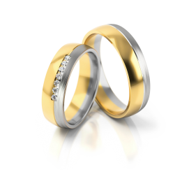 Masywna obrączka ślubna z żółtego złota z domieszką białego z cyrkoniami lub brylantami
