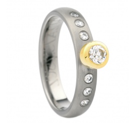 Nowoczesny pierścionek z tytanu i żółtego złota 18K z 7 cyrkoniami