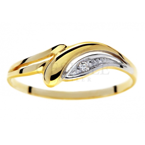 Subtelny i elegancki pierścionek z żółtego złota z brylantem o masie 0.01 ct