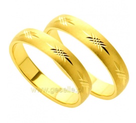 Klasyczne obrączki ślubne z żółtego złota z delikatnym detalem