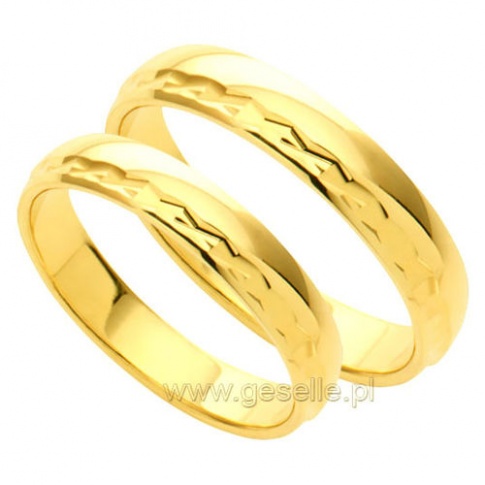 Delikatne obrączki ślubne z żółtego złota z ozdobnym brzegiem