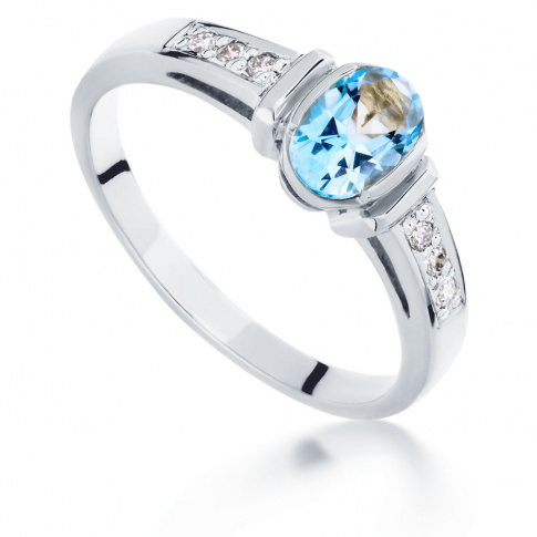 Niebanalny pierścionek w stylu retro z białego złota z topazem blue i wiecznymi brylantami