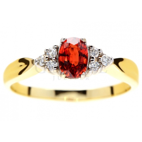 Oryginalny pierścionek ze złota z brylantami i czerwonym szafirem idealny na romantyczne zaręczyny
