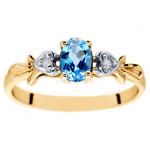 Pełen elegancji pierścionek zaręczynowy z intensywnie błękitnym topazem i brylantami w duecie z żółtym złotem