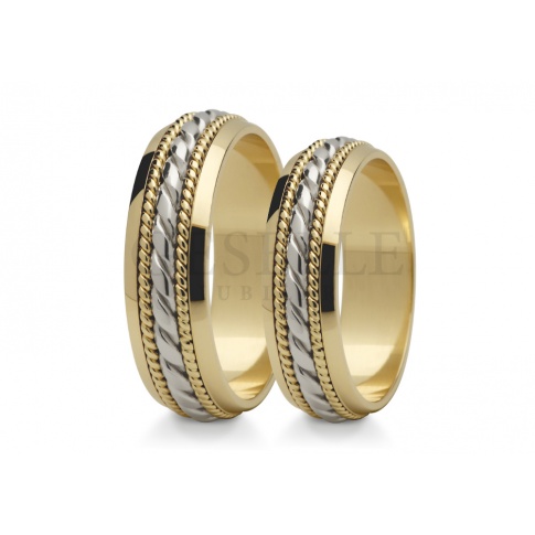 Romantyczne obrączki ślubne z dwóch kolorów złota z wspaniałym zdobieniem na szynie