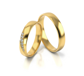Klasyczna obrączka ślubna wykonana z żółtego złota zwieńczona wstęgą kamieni w oprawie jubilerskiej