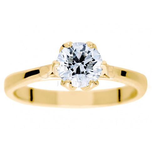 Lukusowy pierścionek zaręczynowy z niezwykłym brylantem o masie 0,90 ct z żółtego złota 