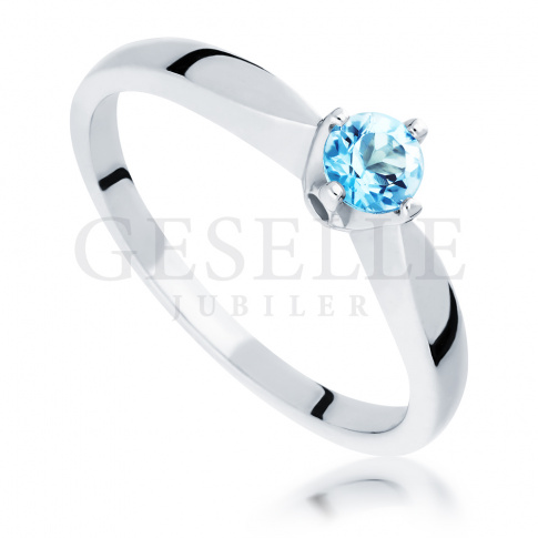 Imponujący klasyczny pierścionek z niezwykłym topazem swiss blue w białym złocie 585