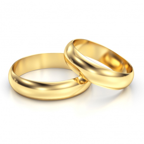 Pełne prostoty i elegancji półokrągłe obrączki ślubne z żółtego złota - szerokość 7 mm