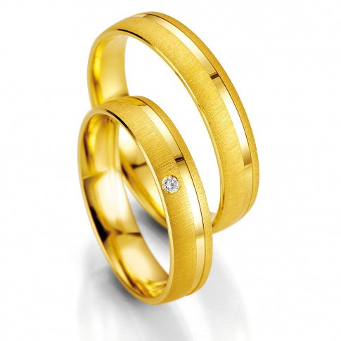 Klasyczne obrączki ślubne z żółtego złota z brylantem firmy Breuning