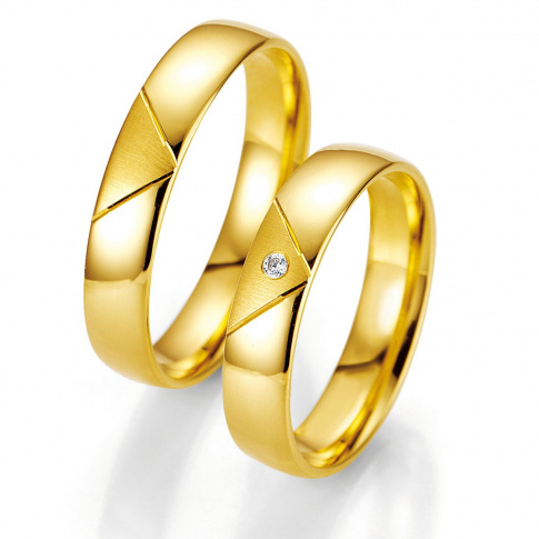 Klasyczne obrączki ślubne ze złota z brylantem od firmy Breuning