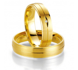 Klasyczne i eleganckie obrączki ślubne z żółtego złota z brylantem