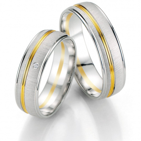 Luksusowe, dwukolorowe obrączki ślubne z białego i żółtego kruszcu firmy Breuning