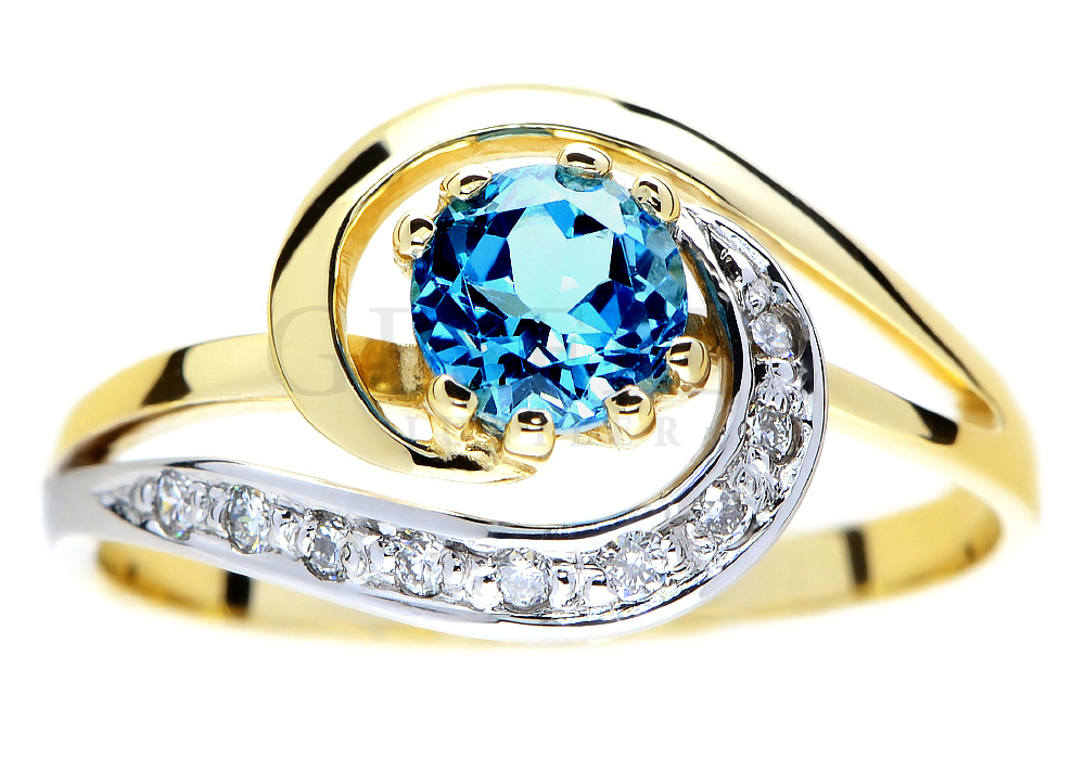Przepiękny pierścionek z topazem blue w towarzystwie brylantów od GESELLE Jubiler